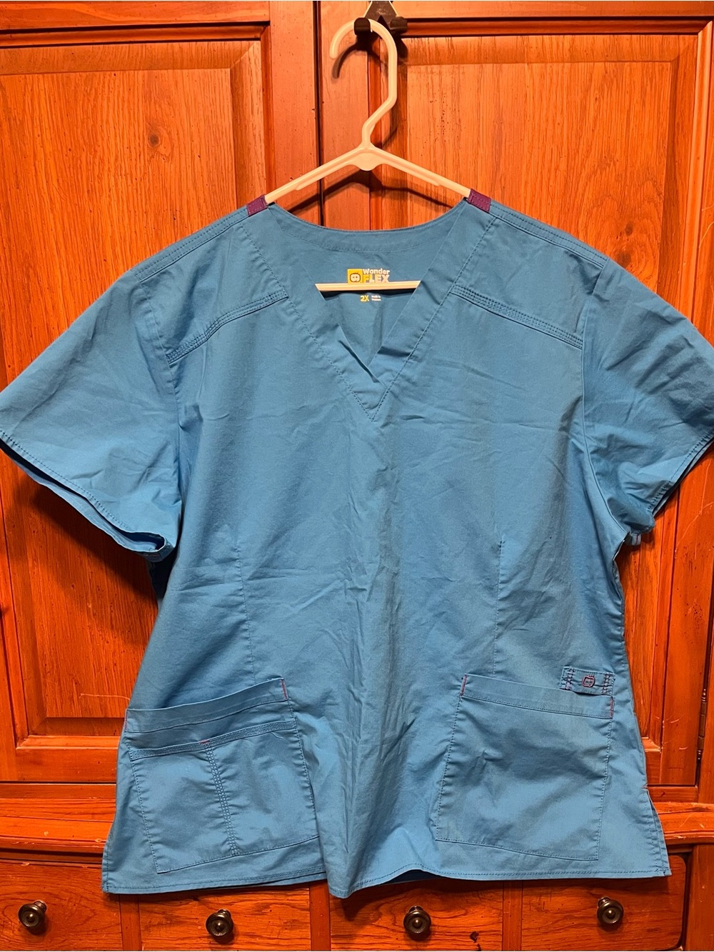 Women's V-Neck Scrub Top in Teal Blue with Front Pockets